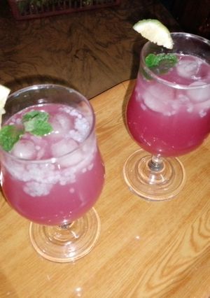 A picture of Pomegranate and sweet basil seeds drink.