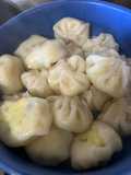 Dumplings rellenos de queso y perejil