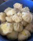 Dumplings rellenos de queso y perejil