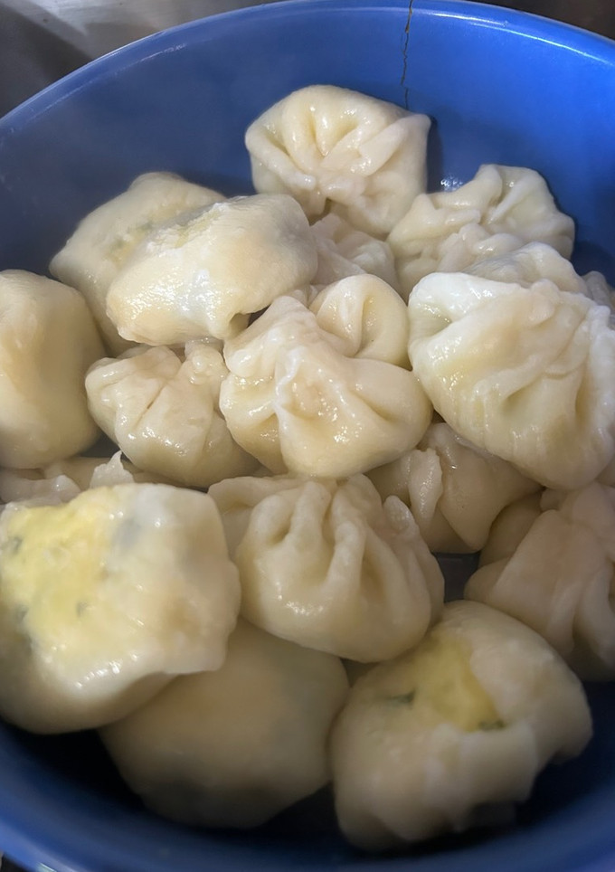 Una foto de Dumplings rellenos de queso y perejil