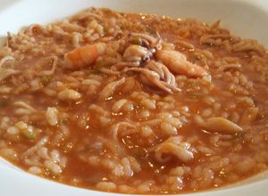 Foto principal de Arroz meloso con chipirones y langostinos