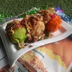 A picture of Tricolor glass Idlis.
