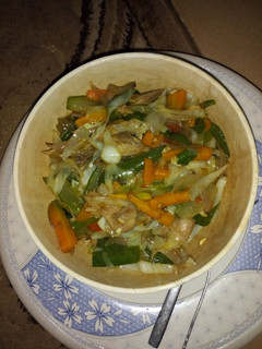 A picture of Vegetable sauce with chicken breast.