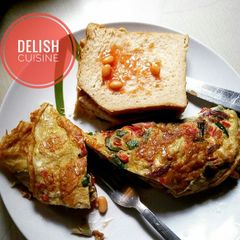 A picture of Bread and omelette roll.