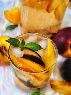 A picture of Orange, Nectarine, Plum, and White Wine Sangria.