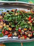 Aubergine et poivron aux tomates confites, coriandre et épices