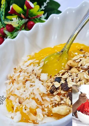 A picture of Custard with Granola,Coconut flakes.