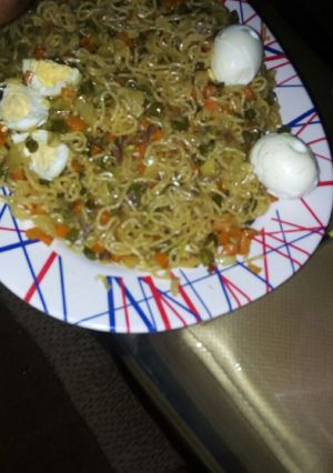 A picture of Noodles with vegies.
