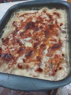 Una foto de Pollo a la crema con papas