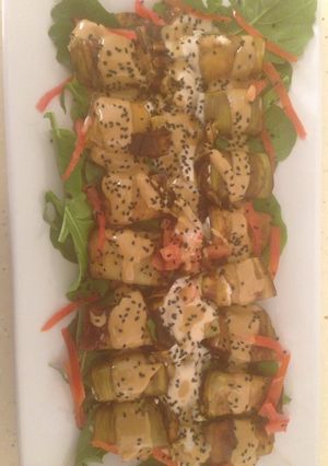 A picture of Eggplant roll with cheese.