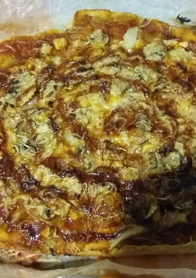 Una foto de Pizza casera de barbacoa