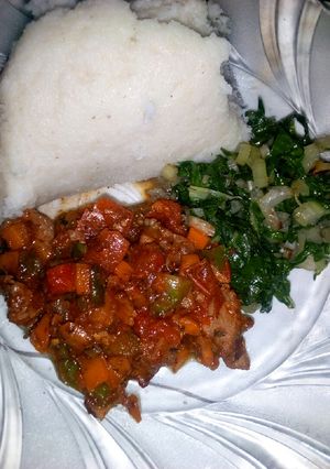 A picture of Steamed spinach and wet fried beef.