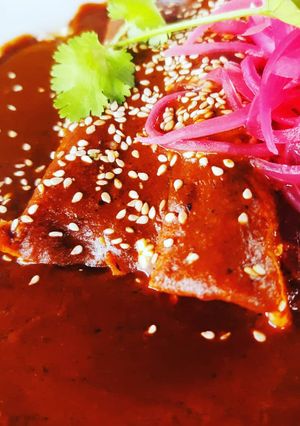 Una foto de Enmoladas de pollo
