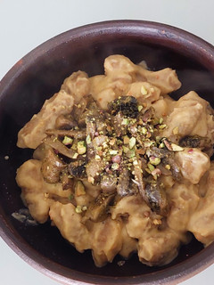 Una foto de Ñoquis Integrales de Zapallo con Salsa de Garbanzos y Champiñones al Pesto