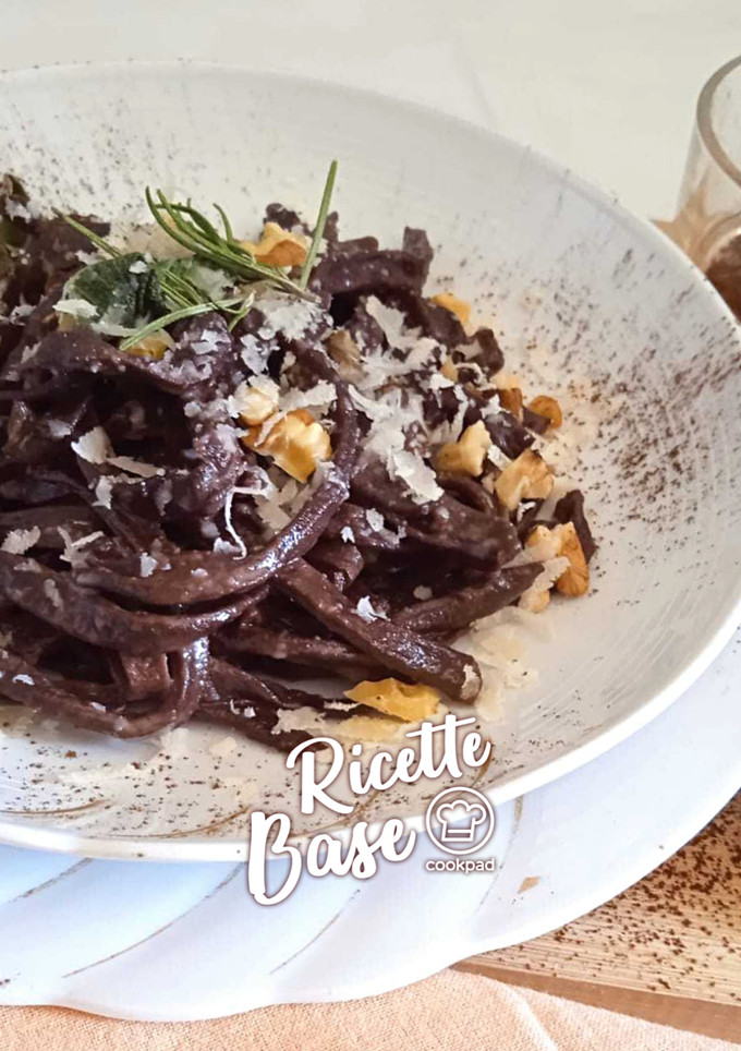 A picture of Cocoa Tagliatelle with Butter, Sage, and Walnuts.