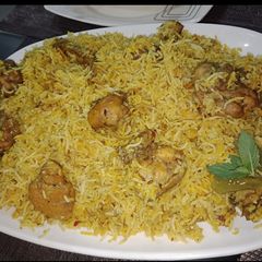 A picture of Chicken tikka biryani.