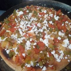 A picture of Pizza at home.