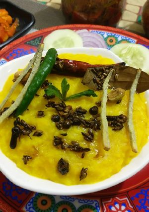 A picture of Khichadi with toor dal & curd.