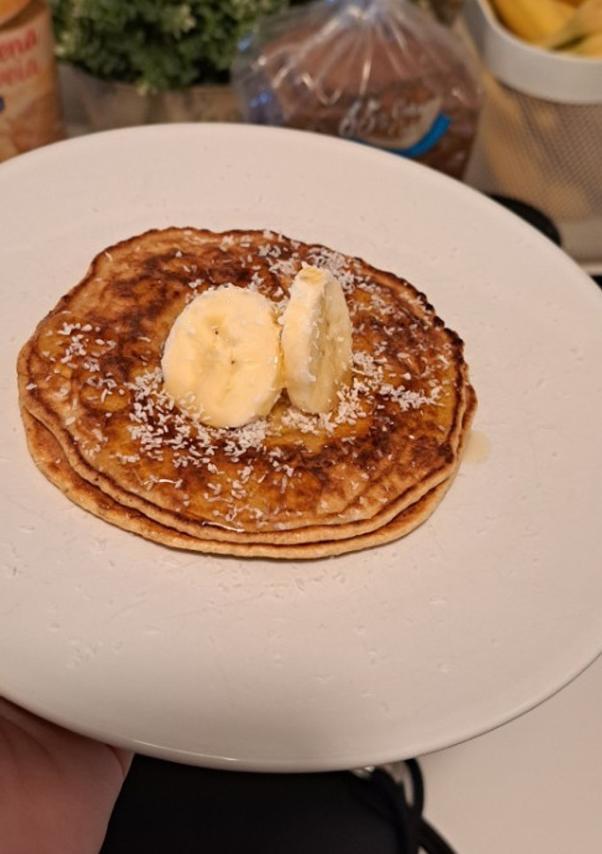 Una foto de Tortitas con plátano y coco para la abuelita