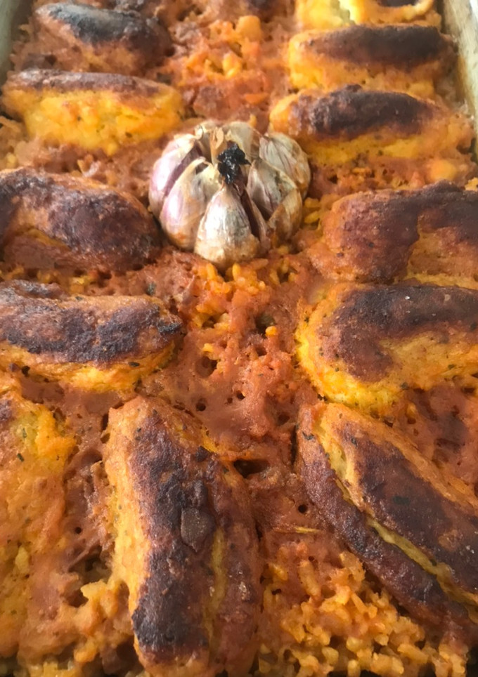 Una foto de Arroz al horno de Pascua. Con albóndigas de bacalao, garbanzos, castañas y pasas
