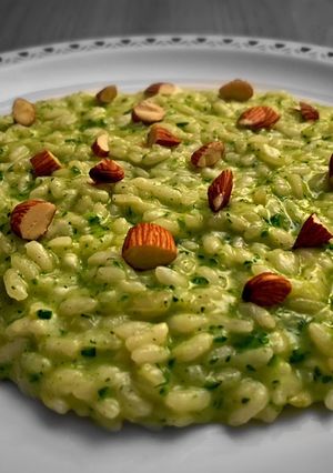 A picture of Zucchini Risotto with Toasted Almonds 🥒🥜.