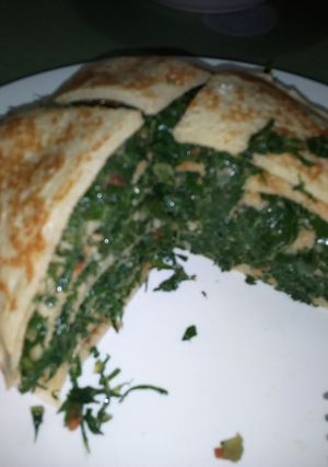 A picture of Sukumawiki Stuffed Pancakes.