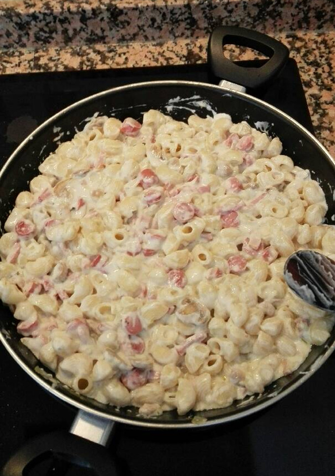 Una foto de Macarrones con nata y queso