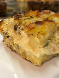 Una foto de Tortilla de papa al horno rellena