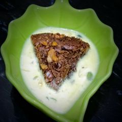 A picture of Wheat Brownie cake with masala milk.