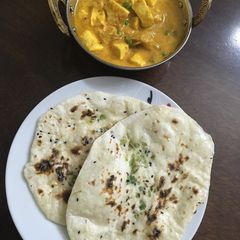 A picture of Plain butter Kulcha with Paneer Gravy.