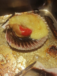 Una foto de Ostiones a la parmesana