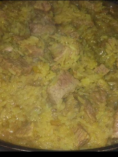 Una foto de Arroz Con Cúrcuma Y Carne