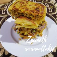 A picture of Indian Style Spring Roll Mutabbaq.