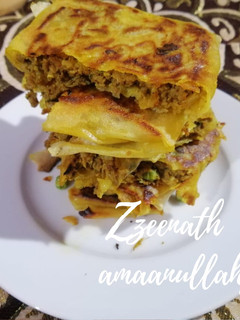 A picture of Indian Style Spring Roll Mutabbaq.