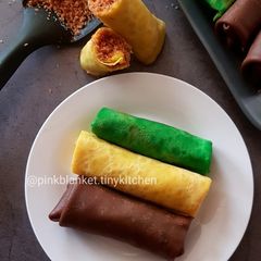 Flavoured Rolled Crepes with Toasted Coconut Filling A picture of Flavoured Rolled Crepes with Toasted Coconut Filling.