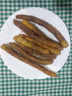 Una foto de Churros con churrera