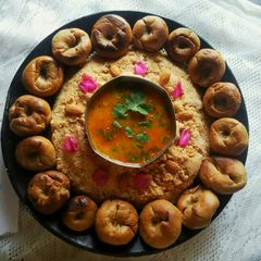 A picture of Dal bati and churma.