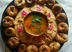 A picture of Dal bati and churma.