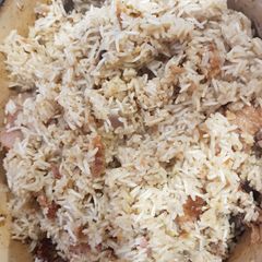A picture of Coconut rice with dry fish.