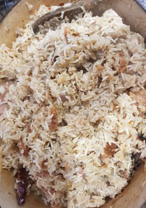 A picture of Coconut rice with dry fish.