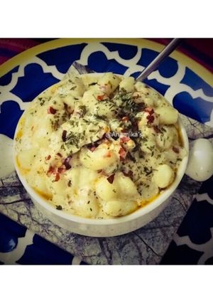 A picture of Eggless: 'Italian Potato Gnocchi' or 'Gnocchi di Patate' (Pasta) in the 'Piedmontese' Style.