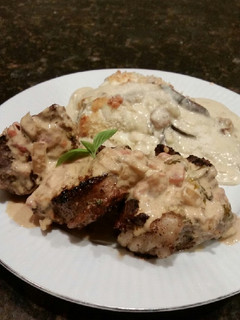 A picture of Brad's lamb chops w/ vodka, tomato, basil, cream sauce.