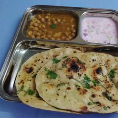 A picture of Pindi Chole with Kulcha.