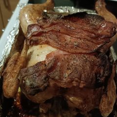 A picture of Crispy bacon whole chicken 🍗.