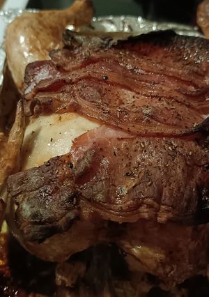A picture of Crispy bacon whole chicken 🍗.