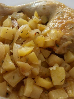 Una foto de Pollo con patatas