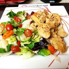 A picture of My Peri peri maranated Chicken breast with Salad. 😀.