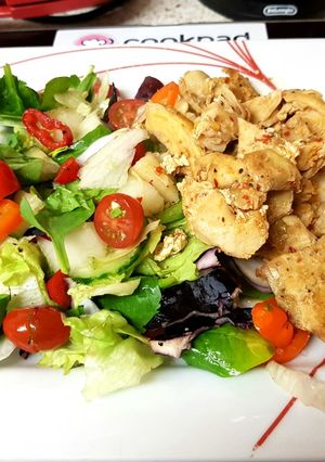 A picture of My Peri peri maranated Chicken breast with Salad. 😀.