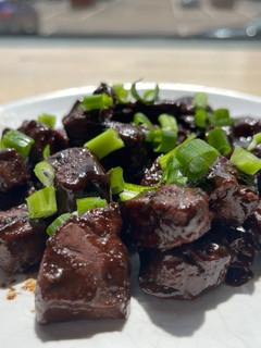 A picture of Lebanese style beef liver with pomegranate molasses.