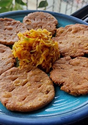 A picture of Basic mathri with mango pickle.